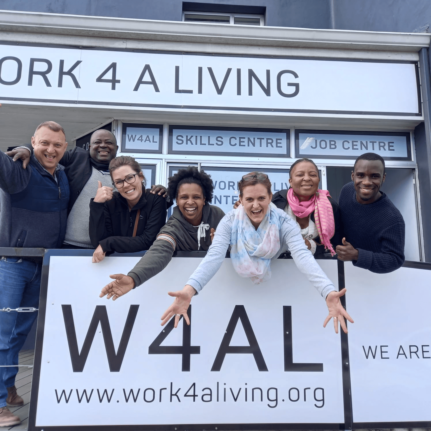 The WORK 4 A LIVING team outside their skills and job centre