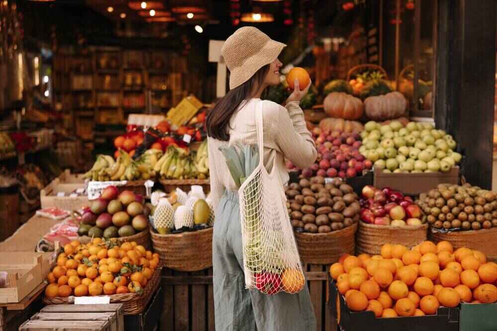 Stalls and shoppers at the Oranjezicht City Farm Market