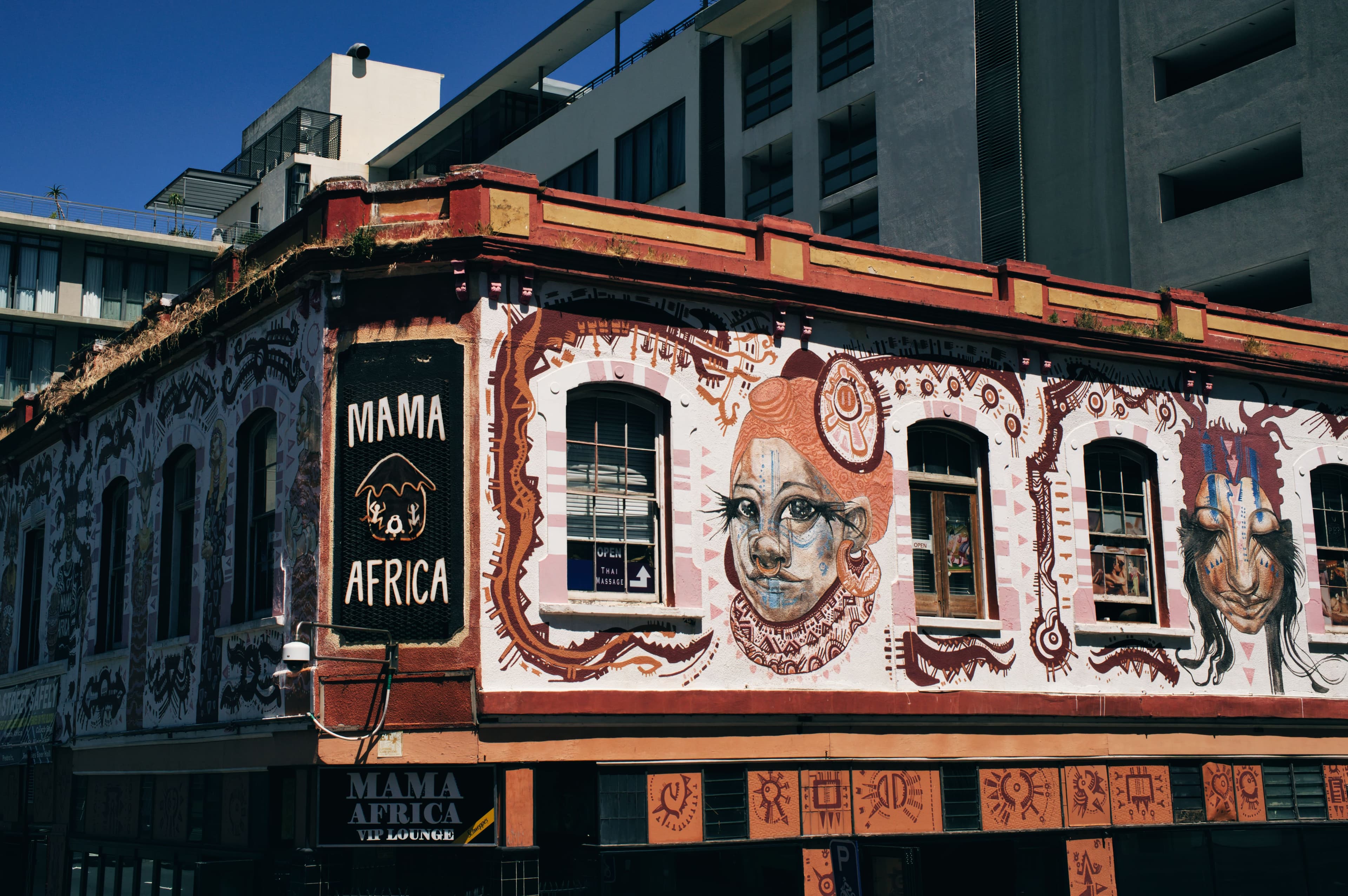 Vibrant African-inspired street art on a building in central Cape Town